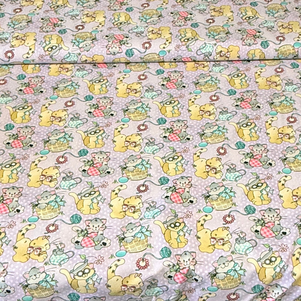 Playful Cats & Yarn on Lavender Print Fabric – 100% Cotton | 45” Wide