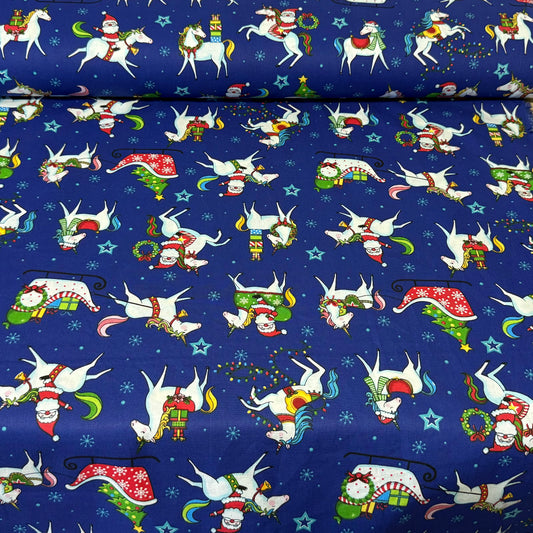Christmas Santa & Unicorns on Royal Blue Print Fabric – 100% Cotton | 45” Wide