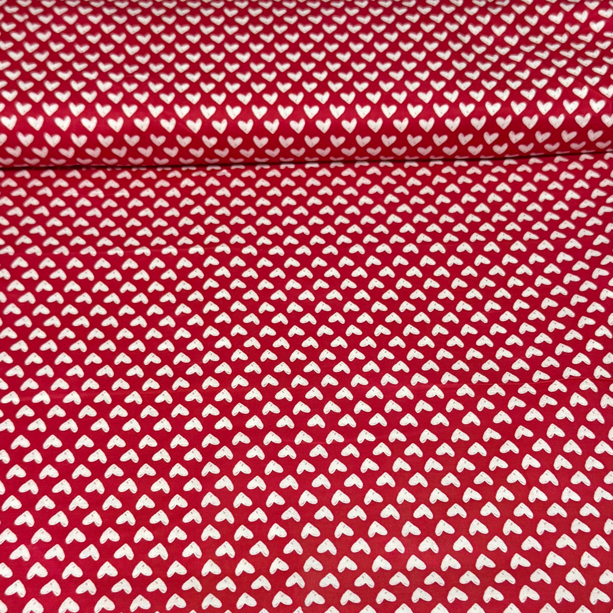 Mini White Hearts on Red Fabric – 100% Cotton | 45” Wide