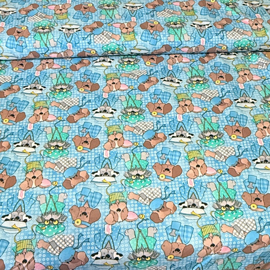 Easter Puppies & Bunny Ears on Aqua Print Fabric – 100% Cotton | 45” Wide